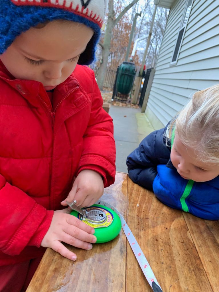 kids using measuring tape